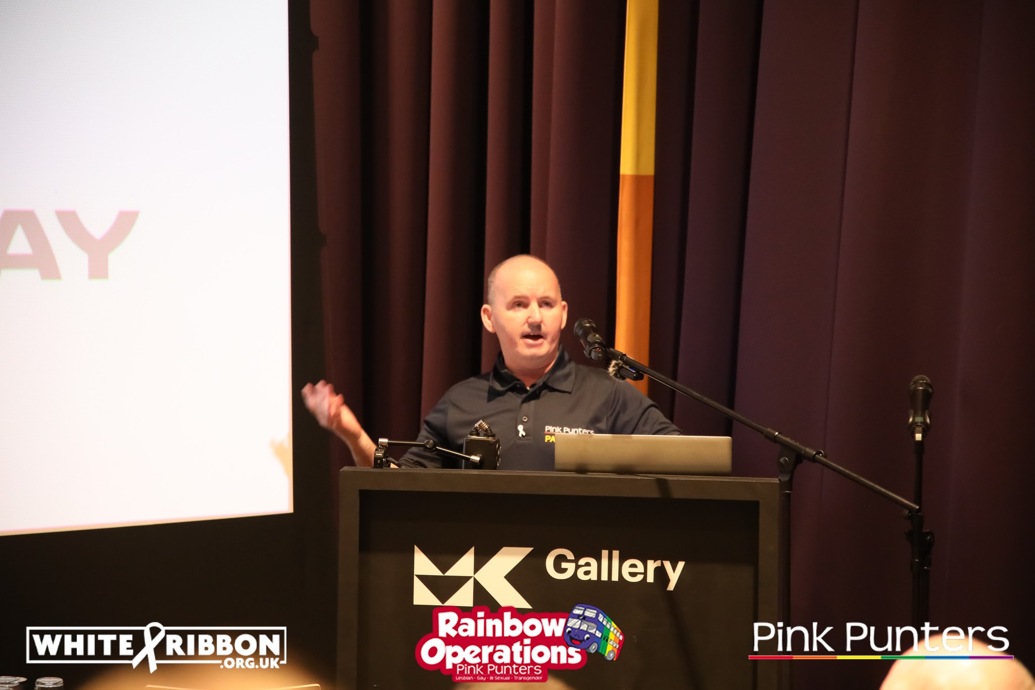 Joe McMahon talking on behalf of Pink's at the White Ribbon event at MK Gallery